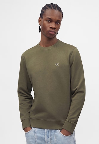 Calvin Klein JeansSweater majica - zelena boja
