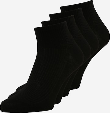 Lindex Κάλτσες σε μαύρο: μπροστά