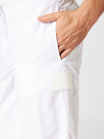 Calvin Klein Jeans Lużny krój Spodnie w kolorze biały