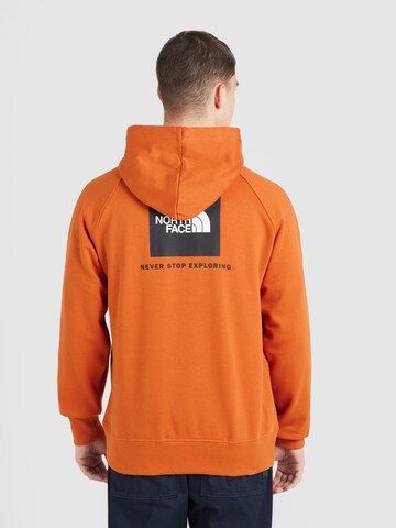 THE NORTH FACE Sweatshirt 'REDBOX' in Orange: front