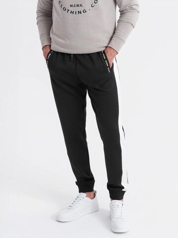 Ombre Regular Sports trousers in Black: front