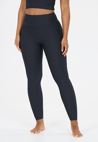 Athlecia Skinny Sportbroek 'Colbie' in Blauw: voorkant