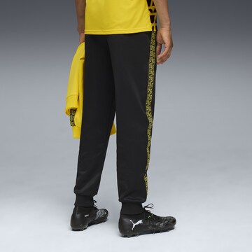 Effilé Pantalon de sport 'Borussia Dortmund KING Anthem' PUMA en noir