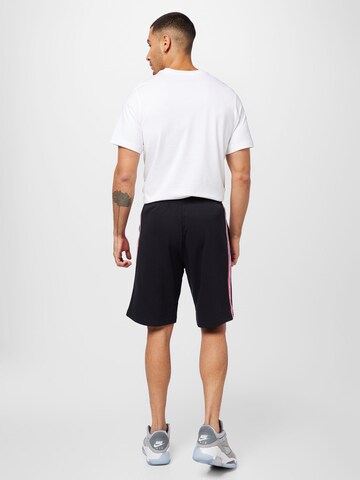 Nike Sportswear Regularen Hlače | črna barva