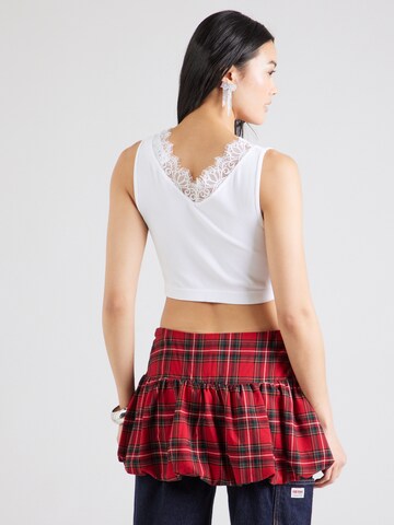 Top 'RAQUEL' di GUESS in bianco