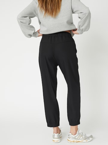co'couture Tapered Housut 'Luna' värissä musta