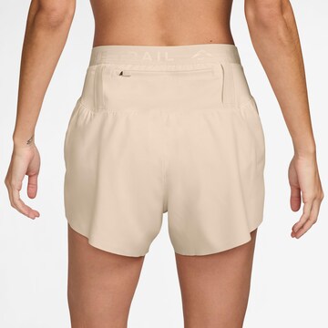 NIKE Regular Athletic Pants 'Trail DF' in Beige