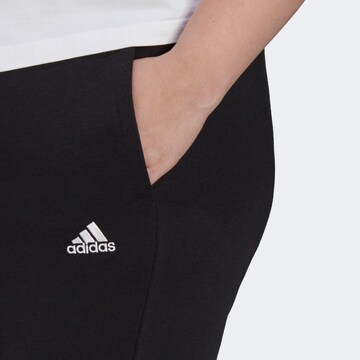 ADIDAS SPORTSWEAR Tapered Παντελόνι φόρμας 'Essentials French Terry Logo ' σε μαύρο