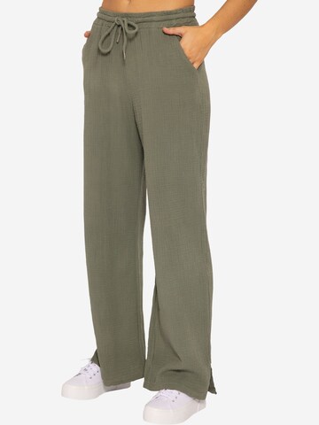 SASSYCLASSY Loose fit Trousers in Green: front