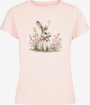 T-shirt 'Niedlicher Osterhase mit Blumen' F4NT4STIC en rose : devant