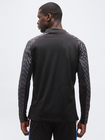 PUMA Functioneel shirt 'teamLIGA26' in Zwart