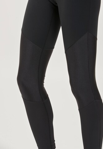 Athlecia Slim fit Sports trousers 'Melasa' in Black