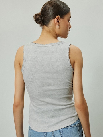 Haut Next en gris