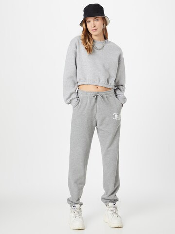 Tapered Pantaloni sportivi di Juicy Couture Sport in grigio