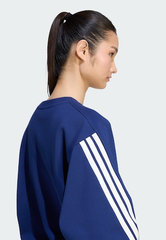 ADIDAS SPORTSWEAR - Camiseta deportiva en azul