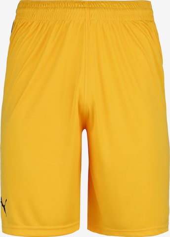 PUMA Loose fit Workout Pants in Yellow: front