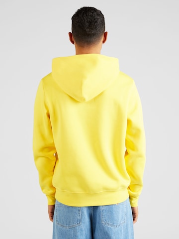 TOMMY HILFIGER - Sweatshirt 'ARCHED VARSITY' em amarelo