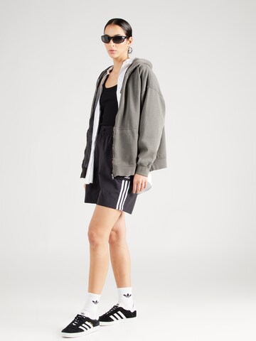 ADIDAS ORIGINALS Loose fit Cargo trousers 'Adicolor' in Black