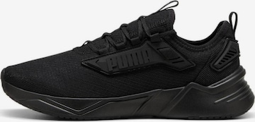 Chaussure de sport PUMA en noir : devant