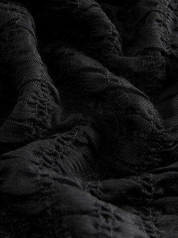 Next - Blusa en negro