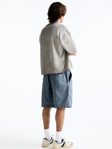 Pull&BearLoosefit Hlače - plava boja