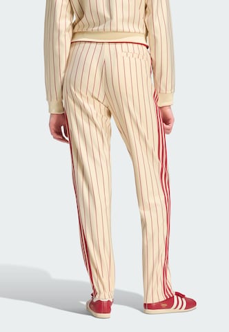 Tapered Pantaloni 'Firebird' di ADIDAS ORIGINALS in beige