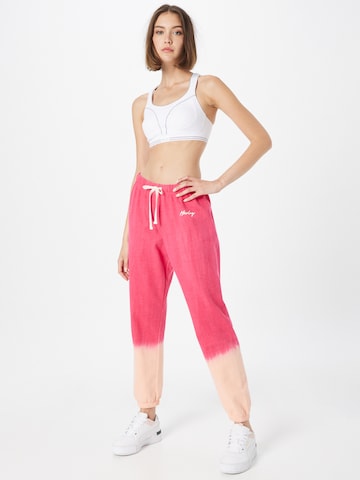 Tapered Pantaloni sportivi di Hurley in rosa