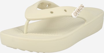 Crocs T-Bar Sandals in Beige: front