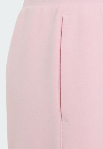 ADIDAS SPORTSWEAR - Loosefit Calças de desporto em rosa