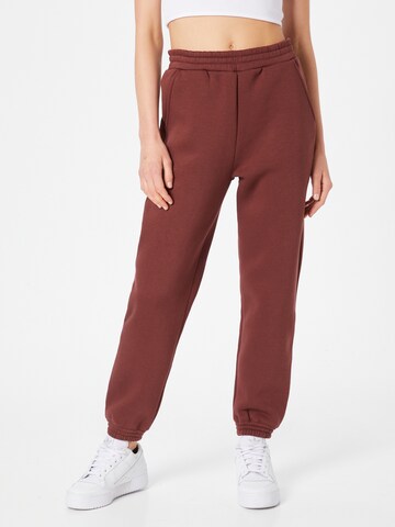 ABOUT YOU Tapered Pants 'Cara' in Brown: front