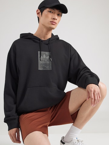 Bluză de molton de la ADIDAS ORIGINALS pe negru: față