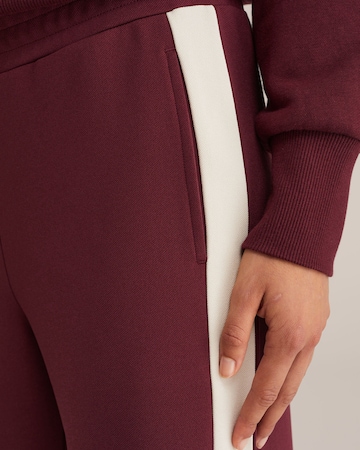 WE Fashion Regularen Hlače | rdeča barva