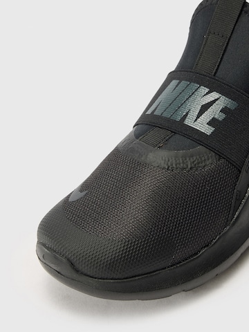 NIKE Urheilukengät 'FLEX RUNNER 4' värissä musta