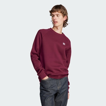 ADIDAS ORIGINALSSweater majica 'Trefoil Essentials ' - crvena boja: prednji dio