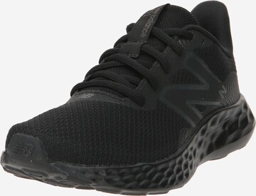 Chaussure de course '411' new balance en noir : devant