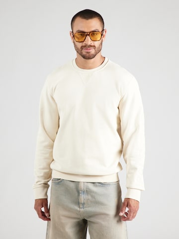GUESS Collegepaita värissä beige: etupuoli