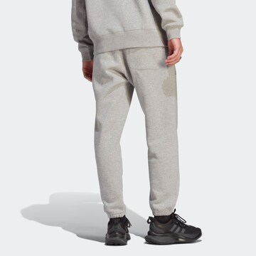ADIDAS SPORTSWEAR Tapered Workout Pants 'All SZN Fleece Graphic' in Grey