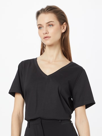 Calvin Klein - Camiseta en negro: frente