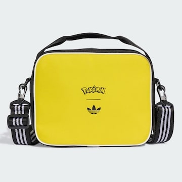 ADIDAS ORIGINALS - Recipiente de almacenamiento 'Pokemon' en amarillo