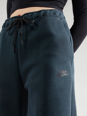 Nike Sportswear Дънки Tapered Leg Панталон 'TCH FLC' в зелено
