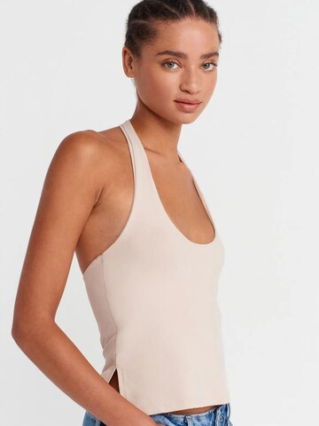Top di Dilvin in beige