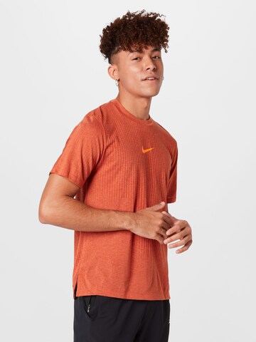NIKE Functioneel shirt 'Pro' in Oranje: voorkant