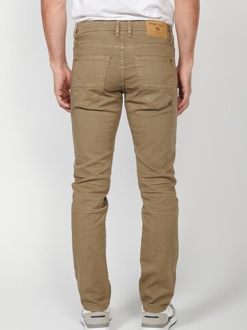 Coupe slim Jean KOROSHI en marron