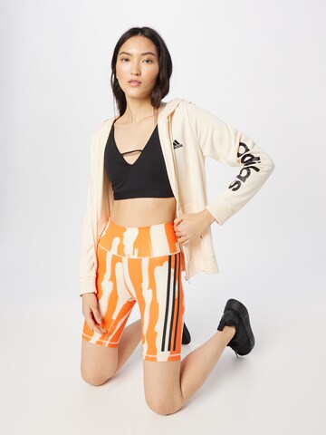 Skinny Pantalon de sport 'Thebe Magugu Bike' ADIDAS SPORTSWEAR en orange