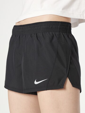 NIKE Regular Sports trousers in Black