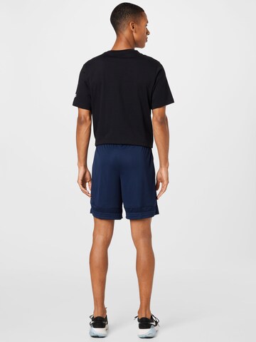 NIKE Regular Workout Pants 'Academy' in Blue
