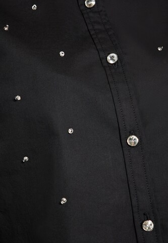 faina - Blusa en negro