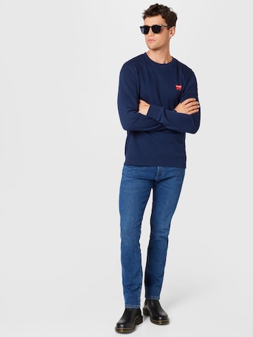 Coupe slim Jean 'LARSTON' WRANGLER en bleu