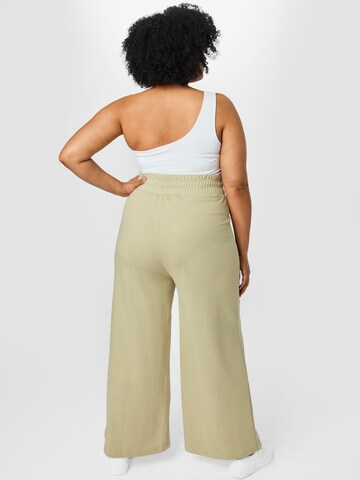 Public Desire Curve Loose fit Trousers in Green