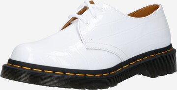 Chaussure à lacets Dr. Martens en blanc : devant